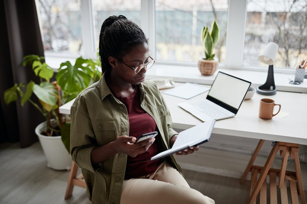 Young Black Woman Working