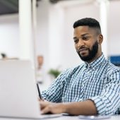 African Man Working in Office